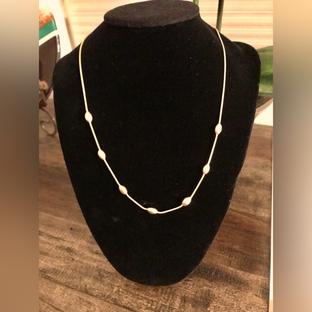 Brushed Gold tone necklace with stationary beads By Avenue